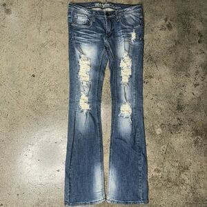 Y2K Mcbling boot cut distressed jeans size 9